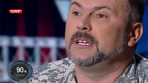 视频截图:正在电视节目中发言的尤里·贝拉扎。